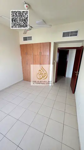 Two-bedroom apartment with a living room for annual rent, with built-in wardrobes, in Al-Nuaimiya 1, next to Al-Hikma School.