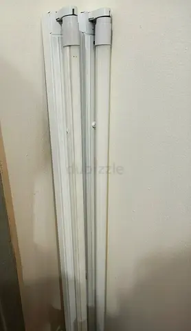 Very Less used two of fluorescent tube light fixtures with tubes