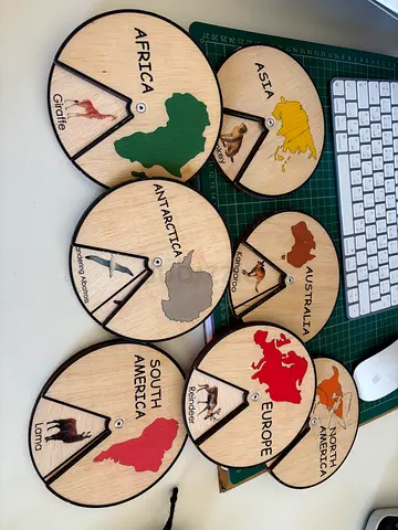 Set of 7 Wooden Continents Puzzles — Educational Animal of that country turning Wheels