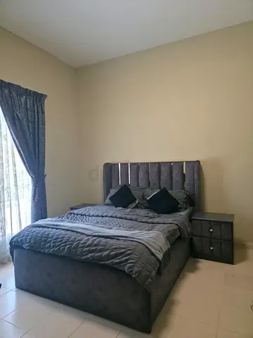 Queen upholstered bed with headboard, mattress and curtains