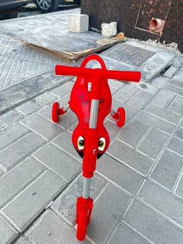Red 3-wheel toddler scooter/trike in good condition