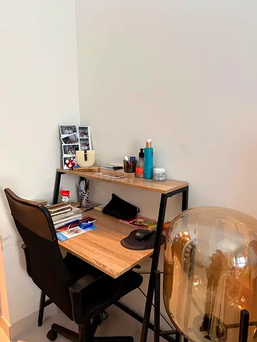 Compact wooden study desk with shelf and office chair