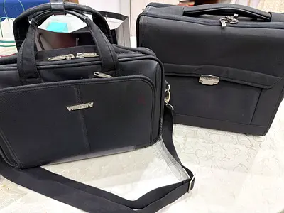 Two black business laptop bags / briefcases - used, good condition price for 1 (70dhs) 2 (120 dhs )