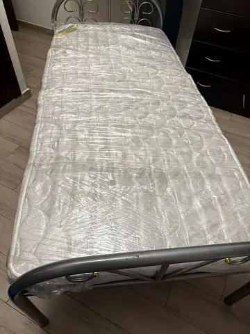 Folding portable single bed, folding bed used