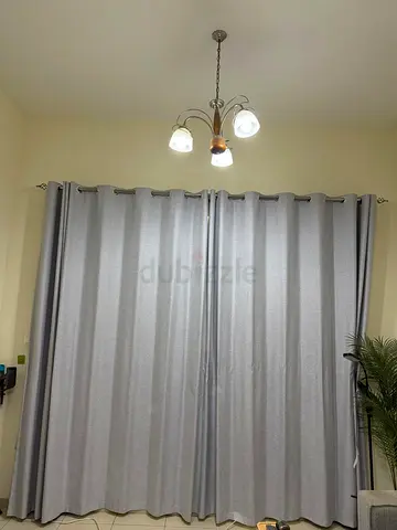 Light blue full-length blackout curtains and sheer curtain. set of 4