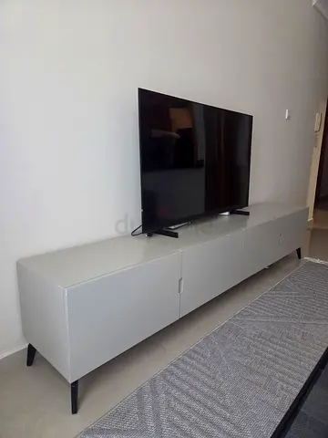 Selling console table under TV beige color 2m