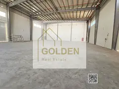 Industrial Warehouse with Mezzanine Ready for Operation for Annual Rent on a Main Road in Umm Al Quw