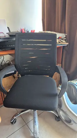 Used ergonomic mesh office chair with lumbar support