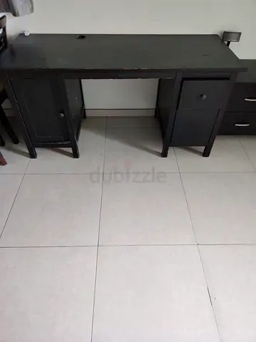 Dark wooden desk with drawers and cabinet - used