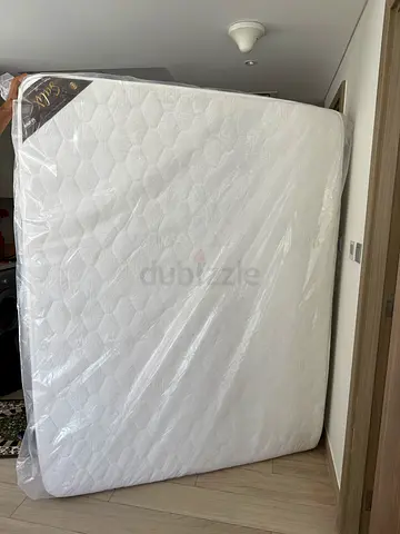 Queen size mattress - brand new, still wrapped in plastic