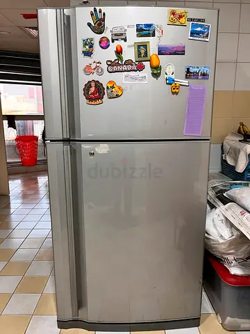 Silver Double-Door Refrigerator - Good Working Condition
