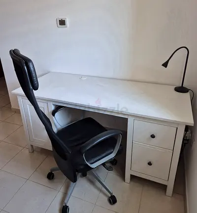 White wooden office desk with drawers and swivel chair