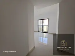 A unique opportunity to live in a brand new building in the Al Jurf Industrial Area, featuring moder
