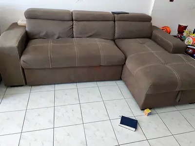 L-shaped brown fabric sofa with chaise - good condition