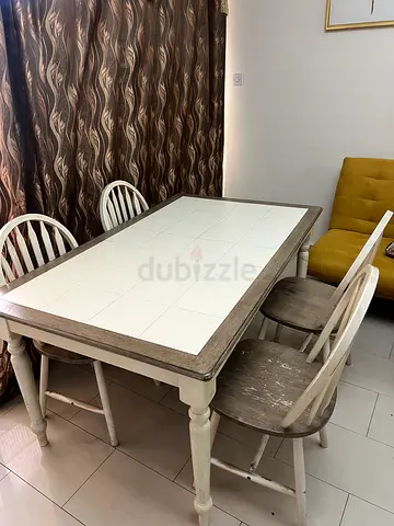 Dinning table and 4 chairs . Home Center brand