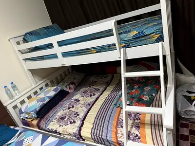 White wooden bunk bed - solid frame with ladder, excellent