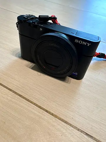 Sony RX100 Series Compact Point-and-Shoot Camera — Good Condition