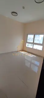 Spacious 2-Bedroom Apartment with Parking for Rent in Afamia Tower – Al Qasimia