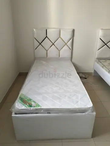 Single white upholstered bed with  mattress 90x190 cm