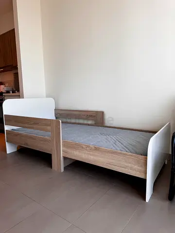 Kids wooden bed frame with headboard and side panel