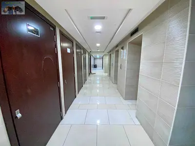 Apartment for rent with two bedrooms living room 3 bathrooms open view balcony built in wardrobes in Al Nuaimiya 1 gym pool parking near Gulfa Bridge.