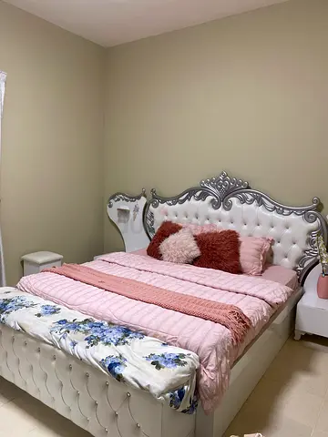 Bed with wardrobe and dressing table