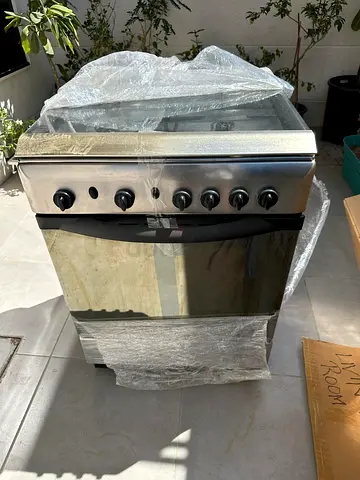 Stainless Steel Freestanding Cooker with Oven - Good Condition