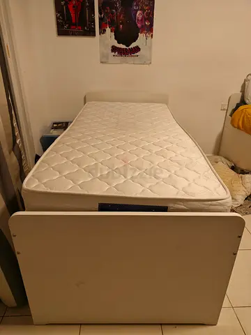 Single white storage bed with two pull-out drawers (includes mattress)