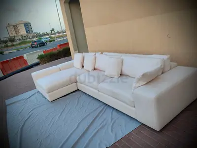 Like new condition eichholtz brand lshape sofa