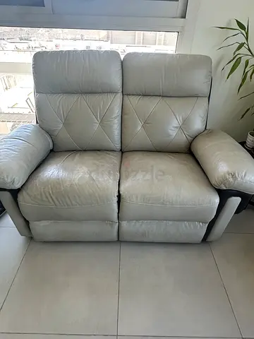 Light grey leather 2-seater reclining sofa, barely used, almost new condition