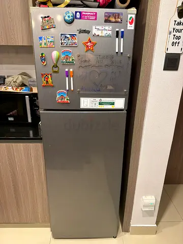 Used single-door top freezer stainless steel refrigerator - good condition