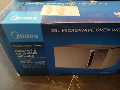 THE ALL NEW 2 IN 1 MICROWAVE OVEN WITH GRILL 29L IN A VERY GOOD PRICE ONLY 350AED WITH BOX NEVER USE