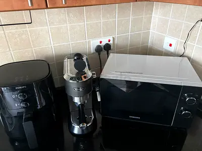 Philips air fryer, DeLonghi espresso machine and Samsung microwave - set of three