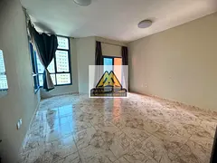 2 Bedrooms and Living Room 3 Bathrooms 2 Balconies Maid’s Room Central Air Conditioning Free Maint