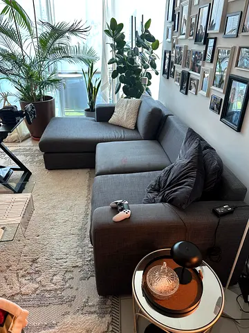 Dark grey L-shaped sectional sofa with ottoman - good condition