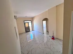Second tenant - 2 bathrooms - separate kitchen - split AC - very large area - easy access to Sharjah