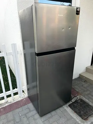 Silver double-door refrigerator - good working condition