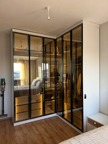 L-shaped glass-front wardrobe corner unit - modern design