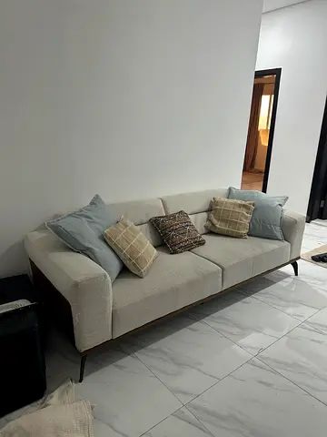 Light grey 3-seater modern sofa with cushions