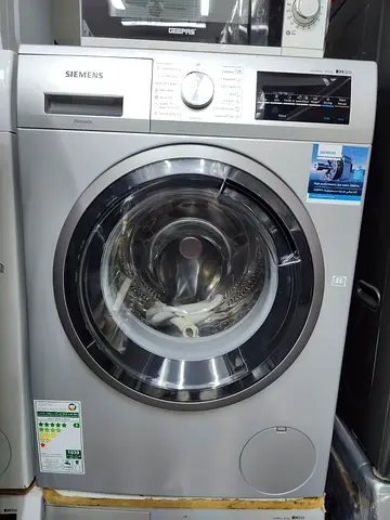 Siemens latest model iq500 8 kg washer and 5 kg dryer freestanding combined machine