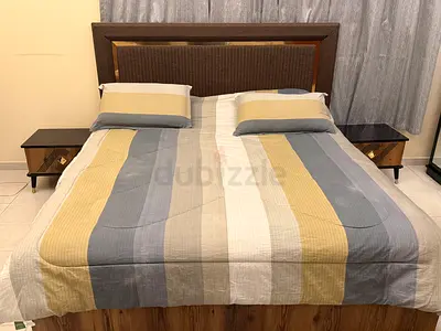 King size bed with Dressing mirror and 2 night stands