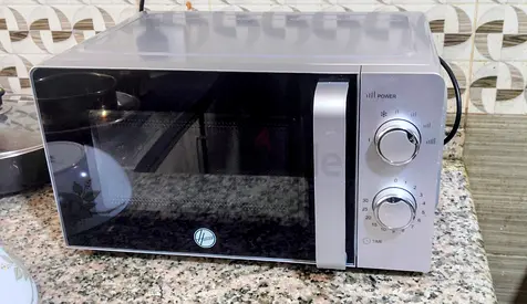Used Countertop Microwave Oven - Manual Dial Controls, Silver