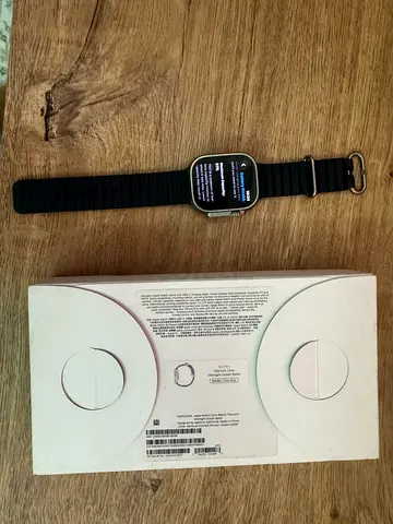 Apple ultra watch with original box and strap with two additional straps