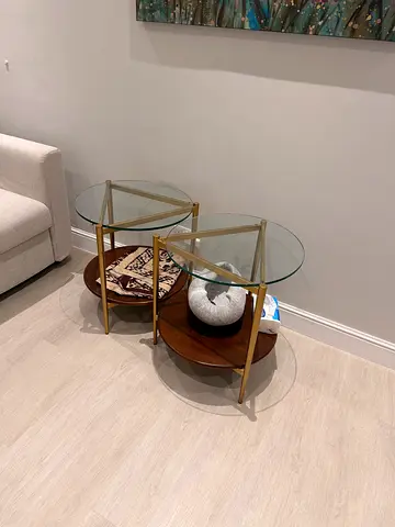 Set of 2 West Elm round glass nesting side tables with brass frame