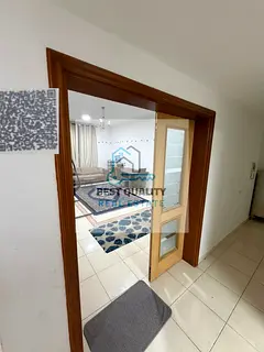Two furnished rooms and a living room for monthly rent in Al Nuaimiya 3, Khalifa Main Street, opposi