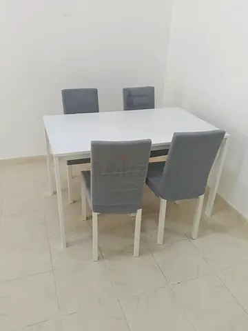 White Dining Table with 4 Grey Upholstered Chairs - Compact Set