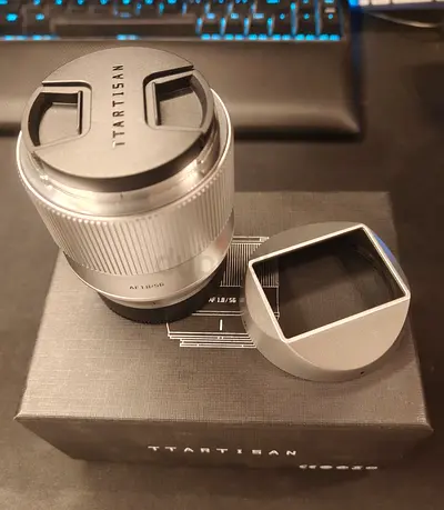 TTArtisan 55mm f/1.8 AF Lens (Silver) with Lens Hood