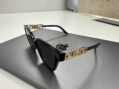Versace Black Cat-Eye Sunglasses with Gold Decorative Temples