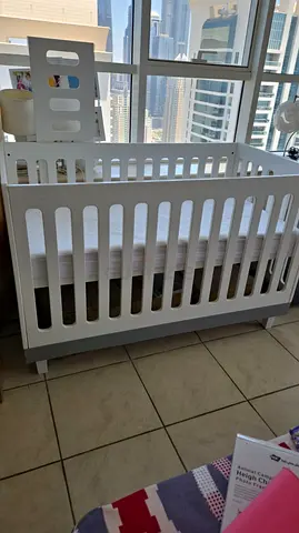 White wooden baby crib with mattress - good condition