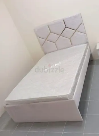 Single upholstered bed with mattress - like new